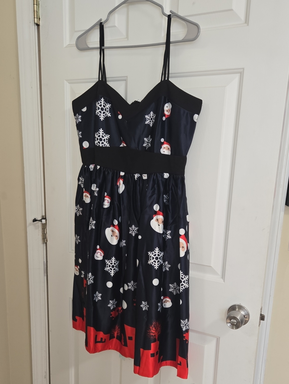 Womenss Black Santa Print Holiday Dress with Red Hem